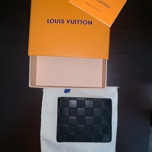 Louis Vuitton multiple wallet barely used.
